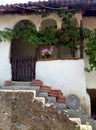 Entrance to a old house with stairs , Serbia Royalty Free Stock Photo