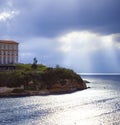 Entrance to old port of Marseille in cloudy day with rays of light during clouds. Famous historical place. Popular travel Royalty Free Stock Photo