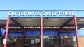 Entrance to Outpatients Department at healthcare hospital building showing sign Royalty Free Stock Photo