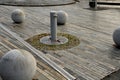 Entrance to the park is secured against the entry of cars by placing concrete balls attached to the paving or asphalt. protection