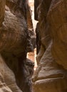 Entrance to the petra monument through a rocky canyon , unesco world heritage site in Jordan