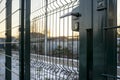 Entrance to the playground of fence and the wicket of the welded wire mesh green Royalty Free Stock Photo