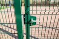 Entrance to the playground of fence and the wicket of the welded Royalty Free Stock Photo