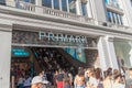 Entrance to the Primark shopping center packed with people in the middle of the afternoon