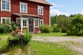 Entrance to red summer house. Royalty Free Stock Photo