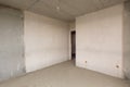 Entrance to the room in new building, plastered and concrete walls Royalty Free Stock Photo