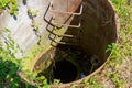 The entrance to secret disguised military bunker. Abandoned bomb shelter. Background