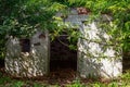 The entrance to secret disguised military bunker. Abandoned bomb shelter. Background