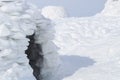 Entrance to the snow cave - Igloo eskimo house Royalty Free Stock Photo