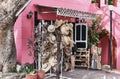 Entrance to store with cuban souvenirs for tourists: straw hats,leather sandals,wooden baseball bats Royalty Free Stock Photo