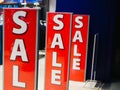 Entrance to the store with sales. Bright sign Sale at the entrance to the store in the shopping center