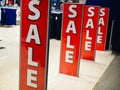 Entrance to the store with sales. Bright sign Sale at the entrance to the store in the shopping center