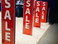 Entrance to the store with sales. Bright sign Sale at the entrance to the store in the shopping center