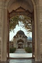 Entrance to the Suleymaniye Mosque in Istanbul (Turkey) - autumn garden - yellow trees in sunset - Islam religion