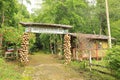 Entrance to Taman Burung dan Taman Anggrek with wooden shack