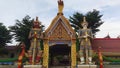 The entrance to the temple has a large giant and a serpent guarding the door.