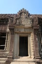 Entrance to temple ruins with detail mural and bas relief in ancient angkor wat, hindu culture and religon in history