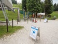 Entrance to a touristic attraction in Bled, for leisure, indicating social distancing and wearing facemask are mandatory inside