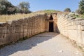 Entrance to the Treasury of Arteus Tomb of Agamemnon near Museum of Mycanae in Greece with strong shadows