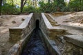 Entrance to tunnel on Loutanis river in Seven spring Epta Piges in forest near Kolymbia Rhodes, Greece Royalty Free Stock Photo