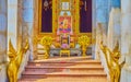 The entrance to Ubosot with golden Naga serpents at the steircases of Wat Bowonniwet Vihara, on April 23 in Bangkok, Thailand
