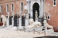Entrance to the Venetian Arsenal with its permanent guard of marble lions. Italy Royalty Free Stock Photo