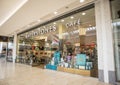 Entrance to Waterstones book shop store showing displays, sign, signage, logo and branding in shopping centre mall