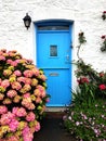 Blue country cottage door Royalty Free Stock Photo