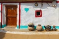 Entrance of traditionally painted house made with mud in a village of Khuri, Jaisalmer, India Royalty Free Stock Photo