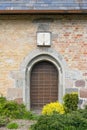 Entrance of the village church of Steinbergkirche in Schleswig-Holstein Royalty Free Stock Photo