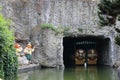 Entrance in an water tunnel with dolls aside from Epidemais Croisiere attraction at Park Asterix, Ile de France, France