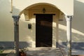 The entrance wooden door in an old Italian church Royalty Free Stock Photo