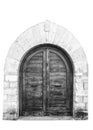 The entrance wooden door in an old Italian house black and white. Royalty Free Stock Photo