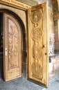 Entrance wooden doors with cross at Church Royalty Free Stock Photo