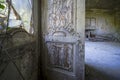 entrance with wooden French window in abandoned house