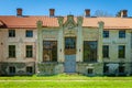 Entranceway to the Arkna mansion with closed door.