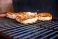 Entrecote Beef Steak On Grill With Rosemary Pepper And Salt - Barbecue.Grilled beef fillet steaks with herbs and spices Royalty Free Stock Photo