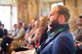 Entrepreneur in audience at business conference. Royalty Free Stock Photo