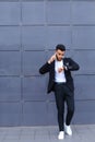 Handsome arabic man talks on smart phone in business center Royalty Free Stock Photo