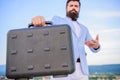 Entrepreneur offer bribe. Illegal deal business. Hipster bearded face hold briefcase with bribe. Business man formal