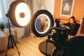 Entrepreneur vlogs in sleek studio, ring light glowinga crafting personal brand with every frame Royalty Free Stock Photo