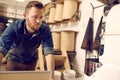 Entrepreneur working in his neat and modern coffee roastery Royalty Free Stock Photo