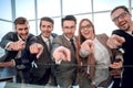 Entrepreneurs point their finger at you while sitting Royalty Free Stock Photo