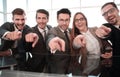 Entrepreneurs point their finger at you while sitting Royalty Free Stock Photo