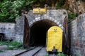 Entry gate to coal mine, leading deep into the earth. Mine shaft of the coal mine, near Resavska Pecina, Serbia