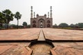 Entry gate of the tomb of Akbar the Great in Agra on overcast day Royalty Free Stock Photo