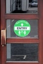 Entry sight on shop door for customer segregation Royalty Free Stock Photo