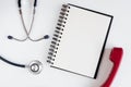 Entry to doctor blank open notebook with stethoscope top view