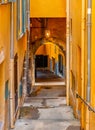 Entry to historic Rue Obscure Dark Covered Street underground passageway in old town of Villefranche-sur-Mer town in France