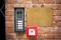 Entryphone on brick wall, close up view Royalty Free Stock Photo